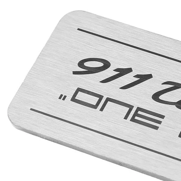 Laser-marked metal nameplate with text and identification